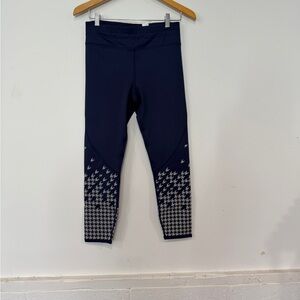 Fabletics mid rise Navy Leggings with Houndstooth Lower Panels